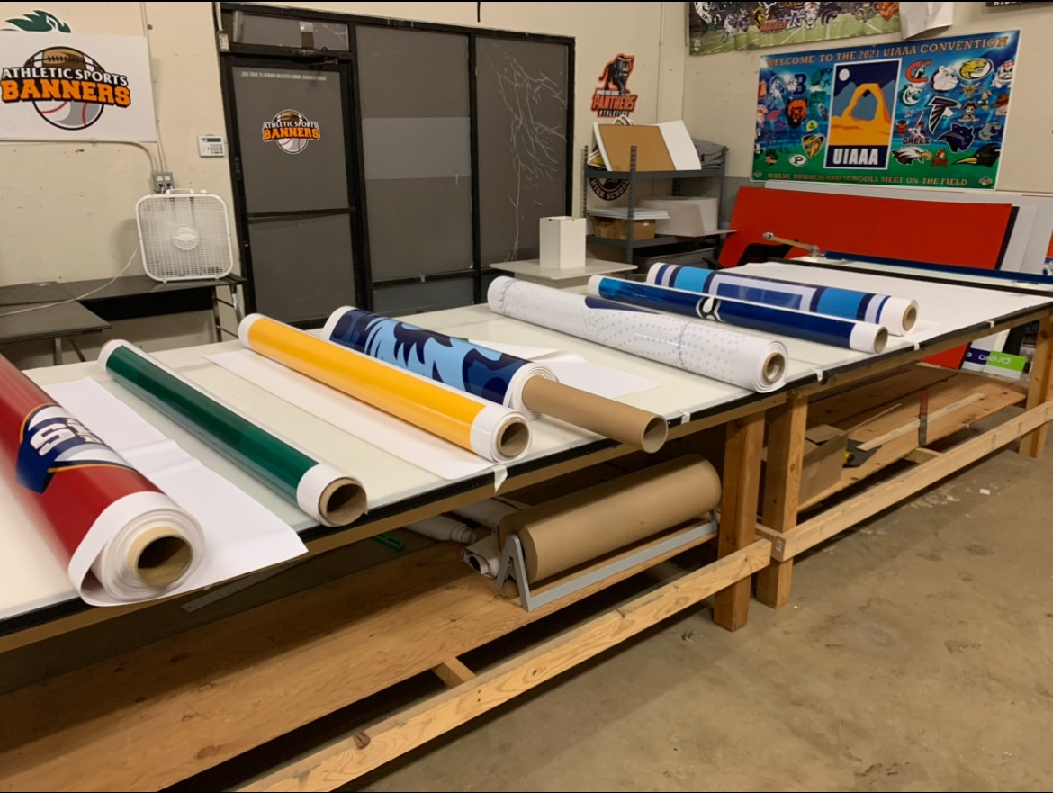 Production tables and colorful vinyl rolls